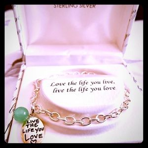 Sterling silver bracelet with charms